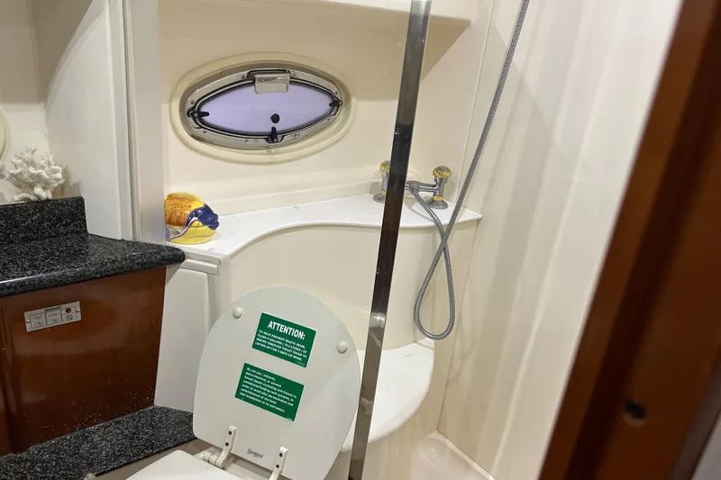 Slide: The Image of Bathroom interior of 2003 Carver 466 Motor Yacht with shower and sink. - 29