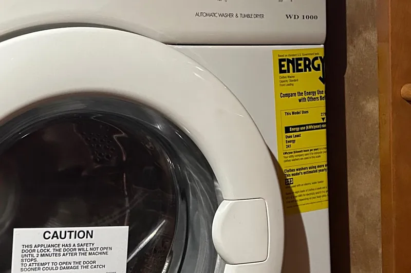 Slide: The Image of Engine room of 2003 Carver 466 Motor Yacht, featuring a Volvo Penta TAMD75EDC engine. - 30