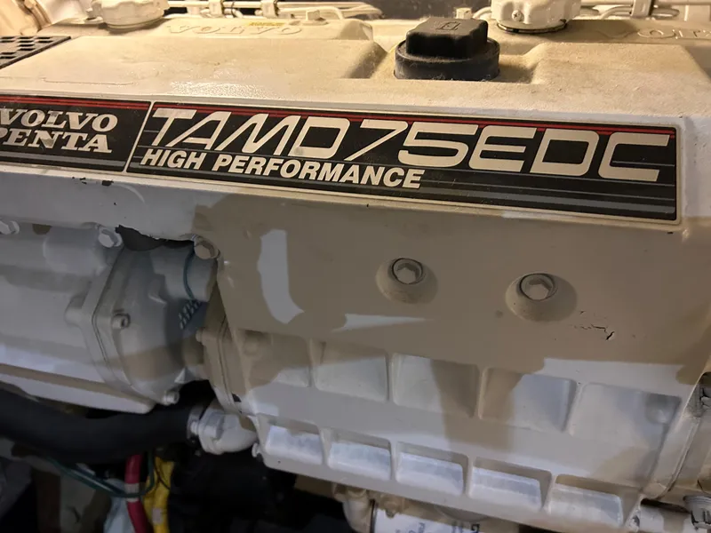 Slide: The Image of Engine room of 2003 Carver 466 Motor Yacht with various mechanical components and wiring. - 34