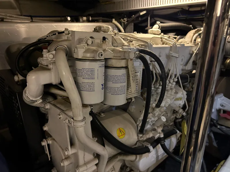Slide: The Image of Engine room of 2003 Carver 466 Motor Yacht, featuring Volvo components and wiring. - 35
