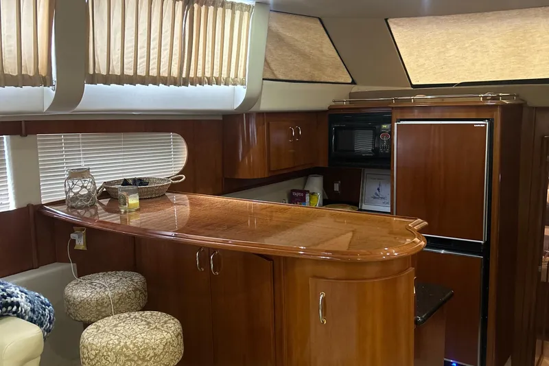 Slide: The Image of Luxurious bedroom interior of 2003 Carver 466 Motor Yacht with elegant wood finishes. - 47