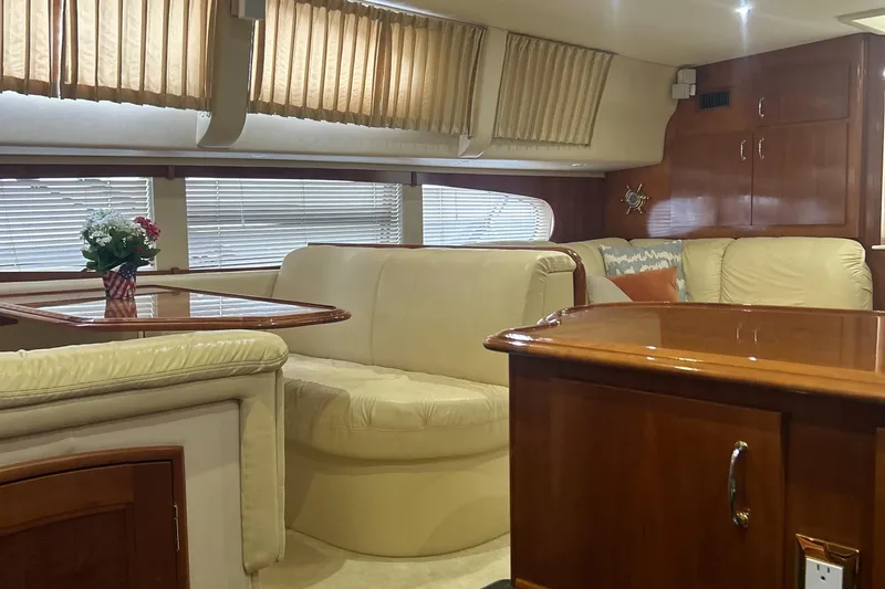 Slide: The Image of Luxurious bedroom interior of 2003 Carver 466 Motor Yacht with elegant wood finish. - 51