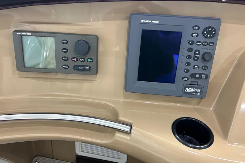 Slide: The Image of Luxurious white seating area in a 2003 Carver 466 Motor Yacht with elegant table decor. - 7