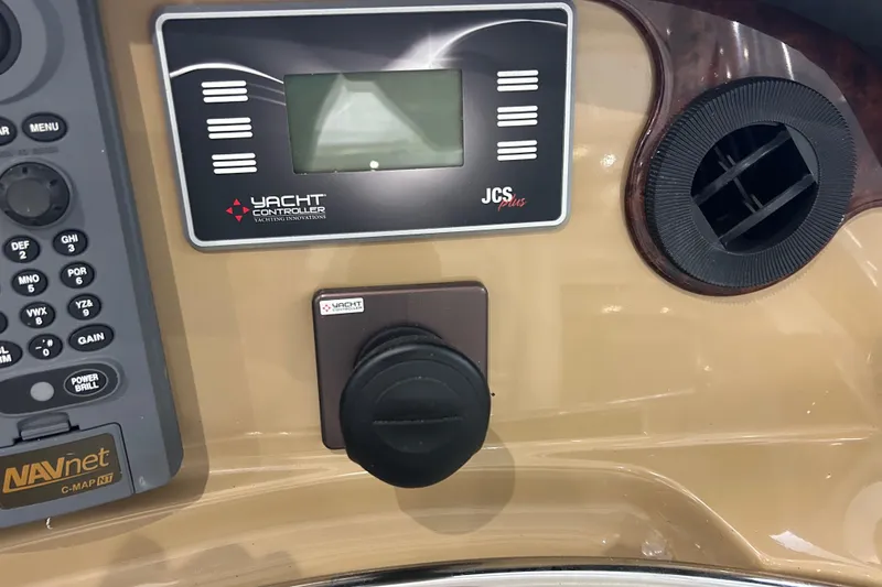 Slide: The Image of Dashboard of 2003 Carver 466 Motor Yacht with navigation and control systems. - 9