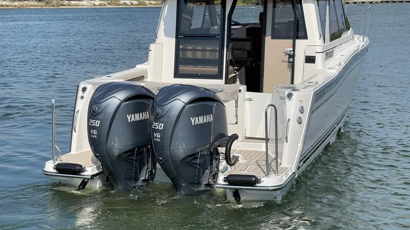 Slide: The Image of 2026 Cutwater C-288 Coupe with dual Yamaha 250 V6 engines on water. - 5