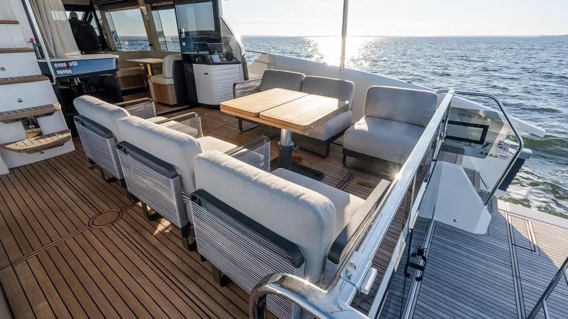 Slide: The Image of Luxury deck of 2025 Absolute 60 Fly yacht with ocean view. - 12