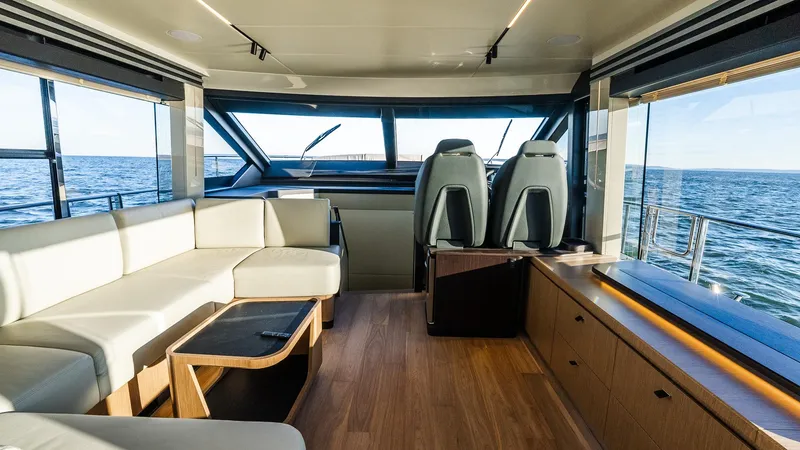 Slide: The Image of Luxurious interior of 2025 Absolute 60 Fly yacht with panoramic ocean views. - 42