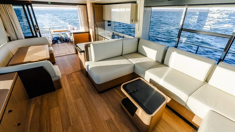 Slide: The Image of Luxurious interior of 2025 Absolute 60 Fly yacht with ocean view. - 45