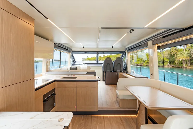 Slide: The Image of Luxurious interior of 2026 Absolute 60 Fly yacht with modern design and scenic views. - 16