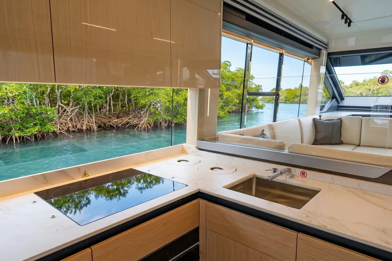 Slide: The Image of Luxurious interior of 2026 Absolute 60 Fly yacht with scenic water view. - 18