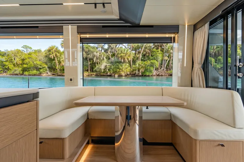 Slide: The Image of Luxurious interior of 2026 Absolute 60 Fly yacht with scenic water view. - 19