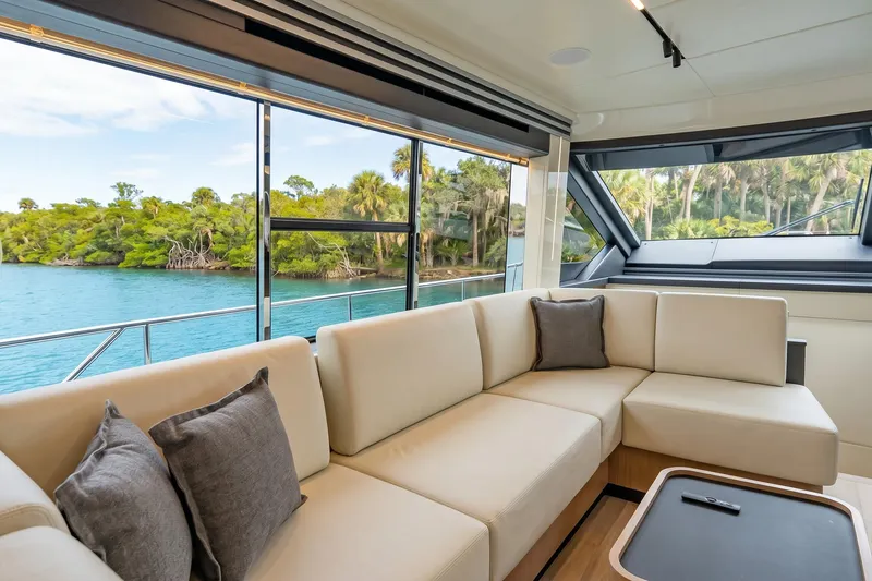 Slide: The Image of Luxurious interior of 2026 Absolute 60 Fly yacht with scenic water view. - 22