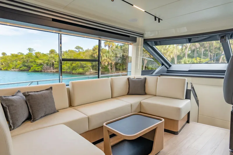 Slide: The Image of Luxurious interior of 2026 Absolute 60 Fly yacht with scenic ocean view. - 23