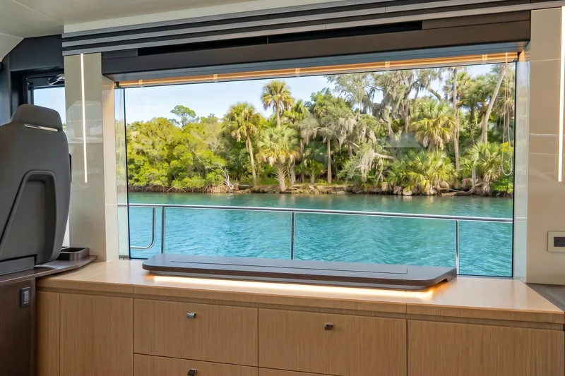 Slide: The Image of Luxurious interior view from 2026 Absolute 60 Fly yacht, overlooking serene tropical waters. - 25