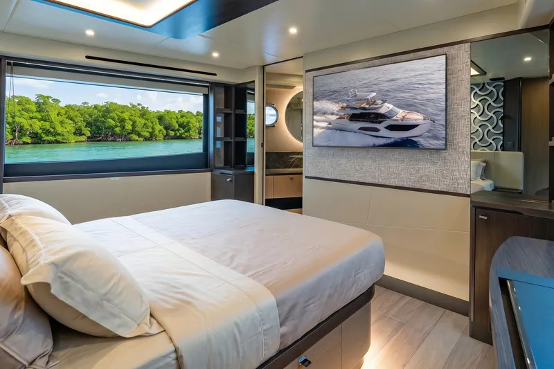 Slide: The Image of Luxurious bedroom interior of 2026 Absolute 60 Fly yacht with scenic ocean view. - 33