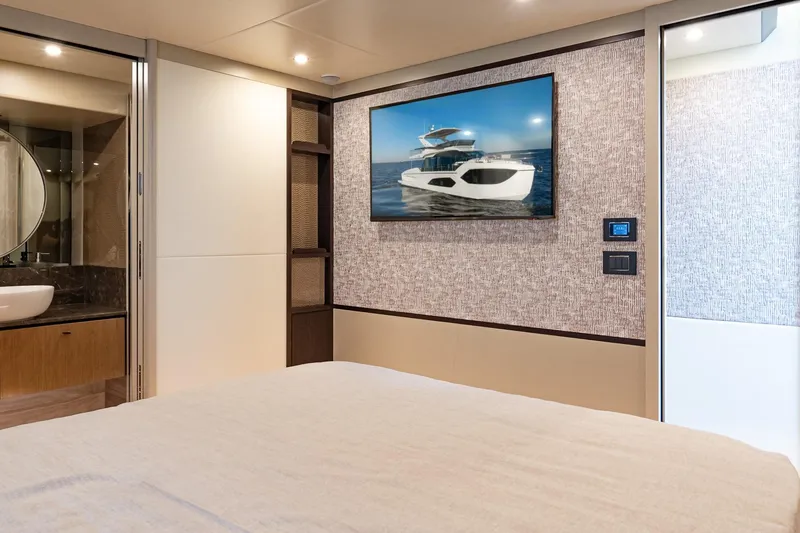 Slide: The Image of Luxurious interior of 2026 Absolute 60 Fly yacht with modern decor and bathroom. - 34
