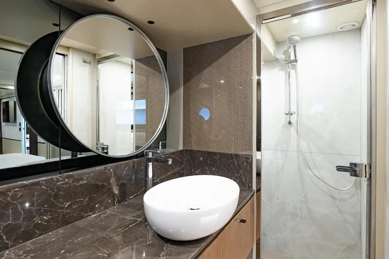 Slide: The Image of Luxurious bathroom in 2026 Absolute 60 Fly yacht with modern fixtures and elegant design. - 36