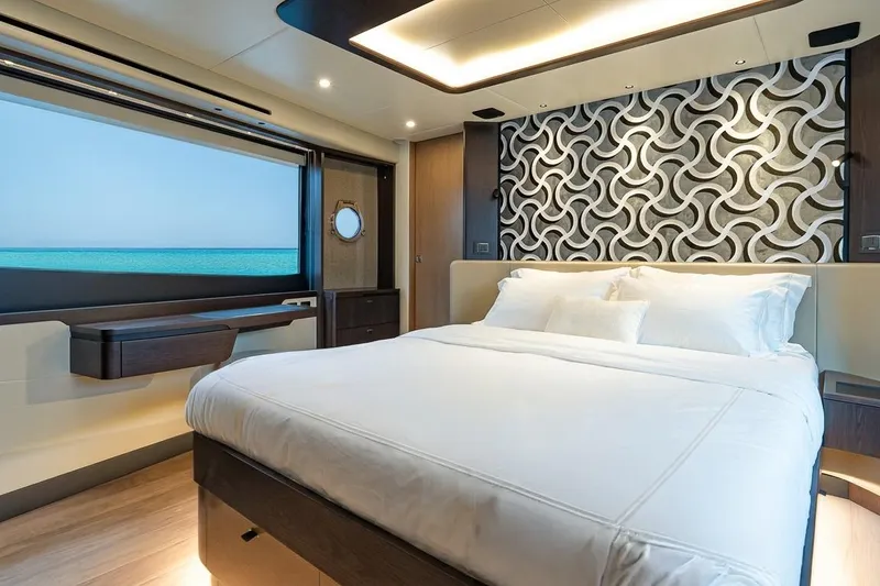 Slide: The Image of Luxurious bedroom interior of 2026 Absolute 60 Fly yacht with ocean view and modern decor. - 39