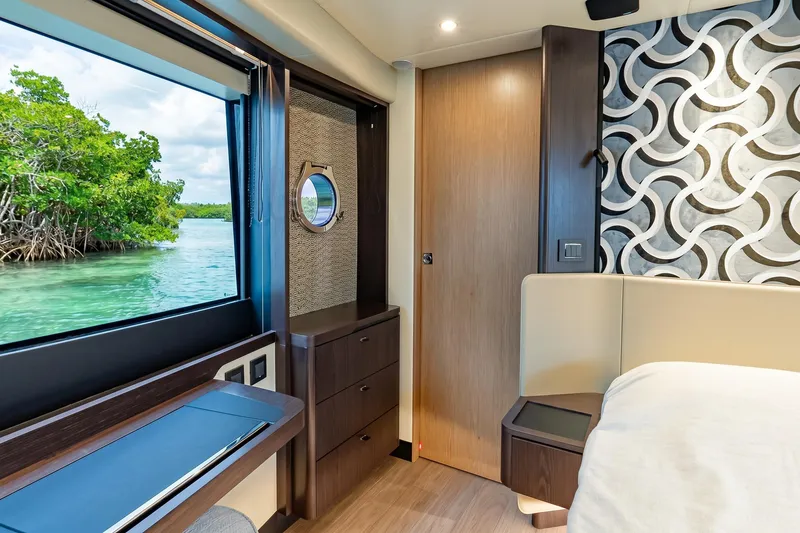 Slide: The Image of Luxurious interior of 2026 Absolute 60 Fly yacht with scenic water view. - 40