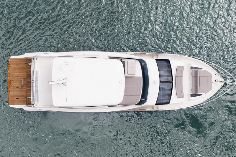 Slide: The Image of Aerial view of 2026 Absolute 60 Fly yacht on water. - 52