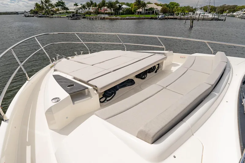 Slide: The Image of Luxurious 2026 Absolute 60 Fly yacht with spacious sunbathing area on deck. - 54