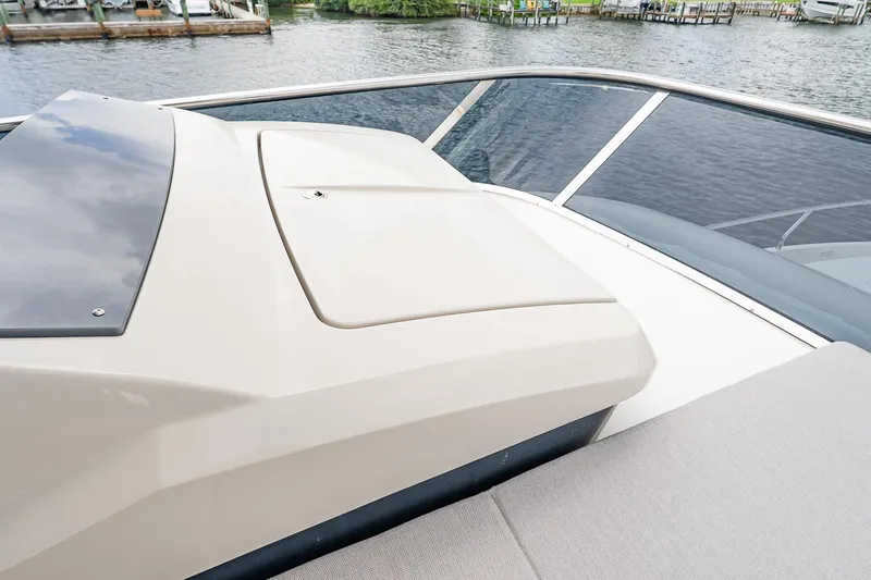 Slide: The Image of Luxury Absolute 60 Fly yacht deck, 2026 model, with sleek design and waterfront view. - 65