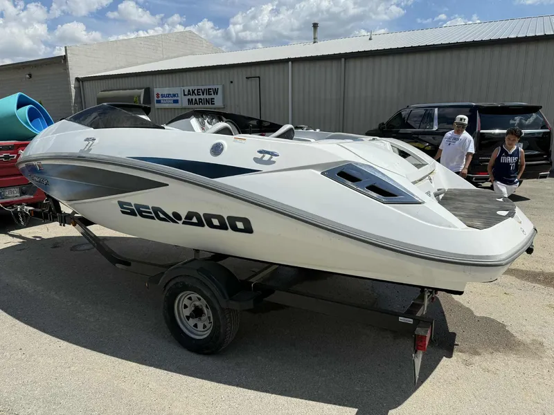 Slide: The Image of 2006 Sea-Doo 180 Challenger boat on trailer at Lakeview Marine dealership. - 12
