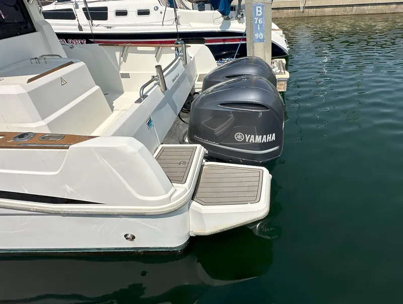 Slide: The Image of Beneteau Barracuda 9 Fly 2012 with Yamaha outboard engines docked at marina. - 7