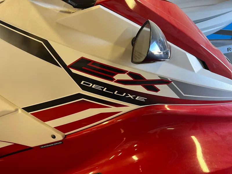 Slide: The Image of 2019 Yamaha WaveRunner EX Deluxe, red and white design, close-up view. - 1