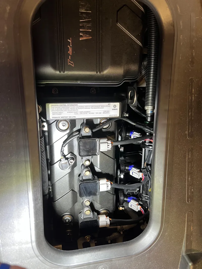 Slide: The Image of 2019 Yamaha WaveRunner EX Deluxe engine compartment, showcasing internal components and wiring. - 7