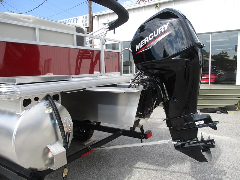 Slide: The Image of 2026 Sun Tracker Bass Buggy 16 XL Select with Mercury outboard motor, rear view. - 10