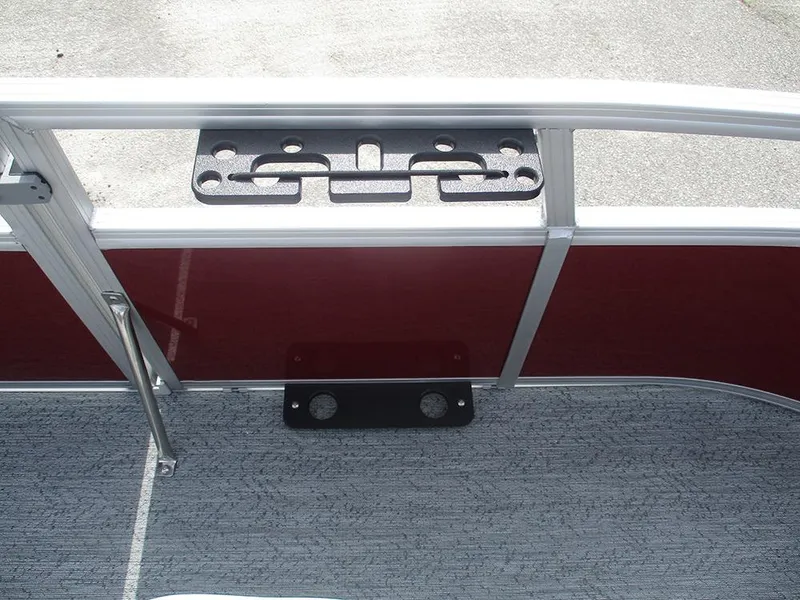 Slide: The Image of 2026 Sun Tracker Bass Buggy 16 XL Select boat interior with red paneling and metal railing. - 26