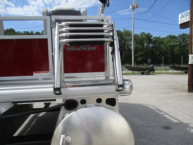 Slide: The Image of 2026 Sun Tracker Bass Buggy 16 XL Select pontoon boat with ladder detail. - 28