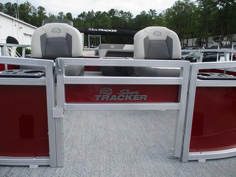 Slide: The Image of 2026 Sun Tracker Bass Buggy 16 XL Select pontoon boat with red panels and seating. - 30