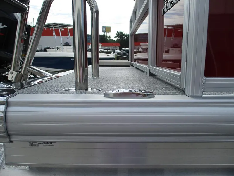 Slide: The Image of 2026 Sun Tracker Bass Buggy 16 XL Select pontoon boat deck and railing detail. - 34