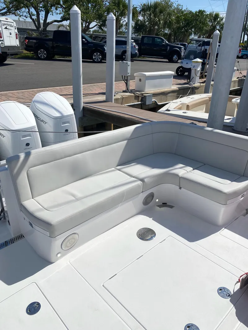 Slide: The Image of 2025 Intrepid 50 Evolution yacht interior with storage cabinets and countertop. - 8