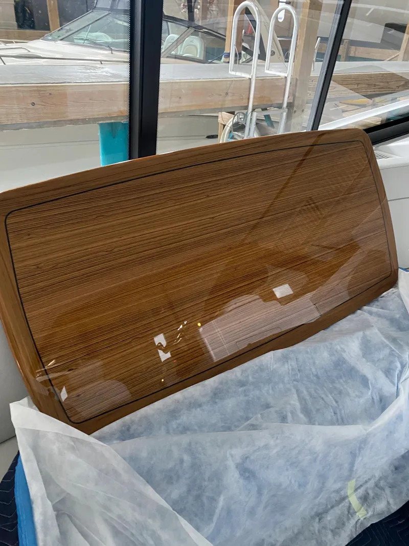 Slide: The Image of Pull-out trash bin in 2025 Intrepid 50 Evolution yacht interior. - 9