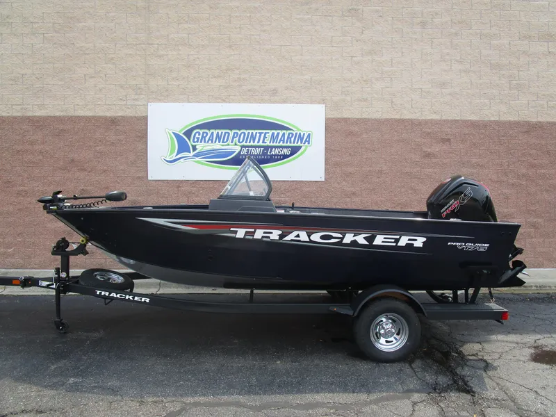 The Image of 2026 Tracker Pro Guide V175 CB boat on trailer at Grand Pointe Marina. - 1
