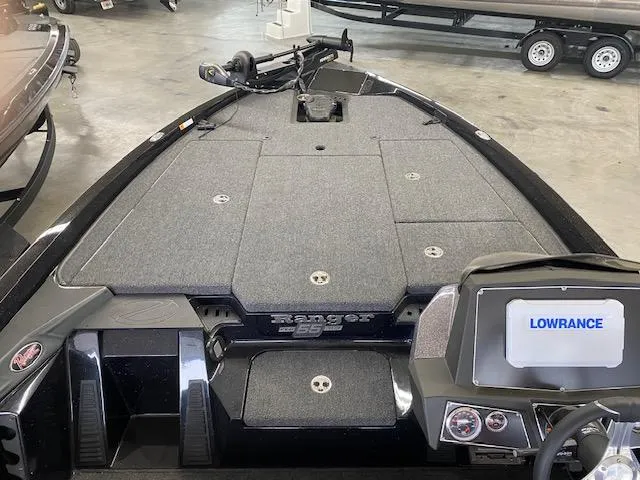 Slide: The Image of 2023 Ranger Z518 boat interior with Lowrance system, featuring spacious deck and modern design. - 4