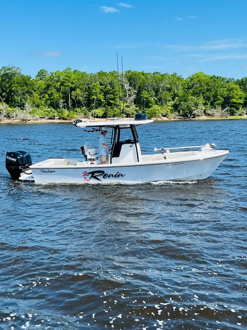 The Image of 2023 Pair Customs 24 Center Console DV on the water. - 0