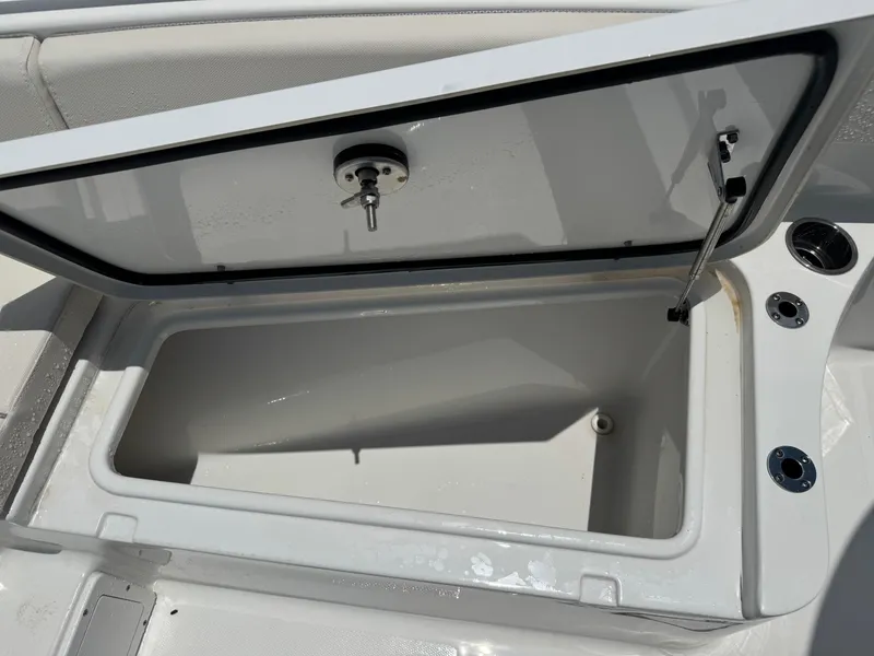 Slide: The Image of Open storage compartment on 2024 Sea Hunt Gamefish 27 Forward Seating boat. - 15