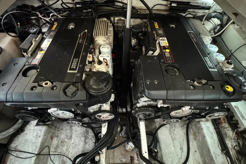Slide: The Image of Engine compartment of a 2006 Rinker 300 Express Cruiser with dual Volvo Penta engines. - 12