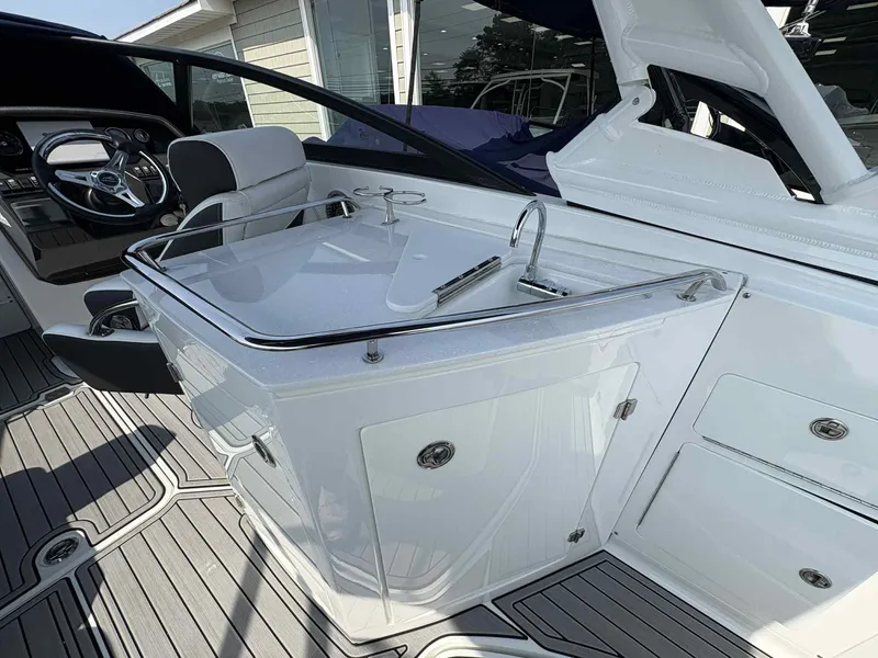 Slide: The Image of Luxury interior of 2023 Monterey M65 boat with sleek helm and modern amenities. - 11