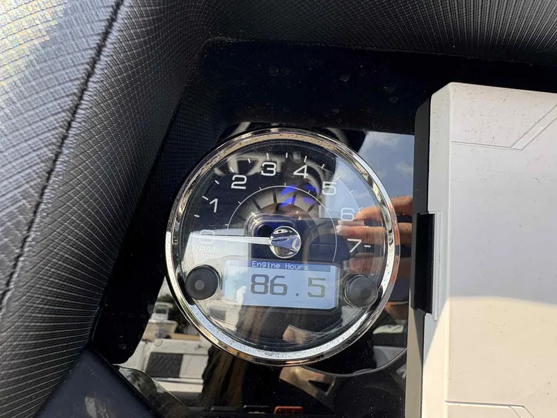 Slide: The Image of Close-up of 2023 Monterey M65 engine hour meter displaying 86.5 hours. - 24