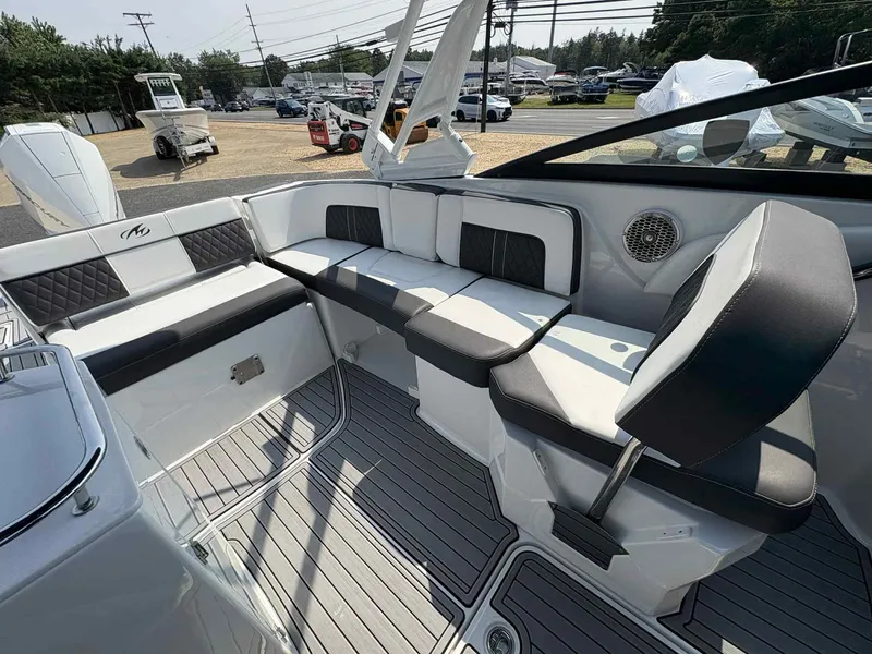 Slide: The Image of 2023 Monterey M65 boat interior with sleek seating and modern design. - 27