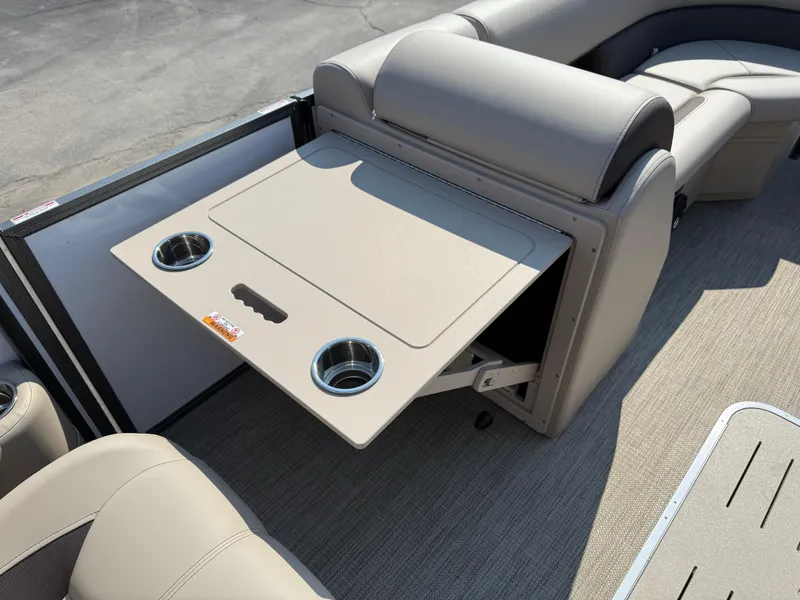Slide: The Image of 2026 Bentley Pontoons Legacy 223 Navigator with fold-out table and cup holders. - 39