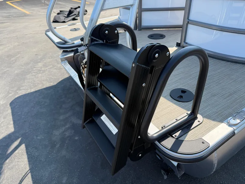 Slide: The Image of Bentley Pontoons Legacy 223 Navigator 2026, featuring a sturdy boarding ladder. - 8