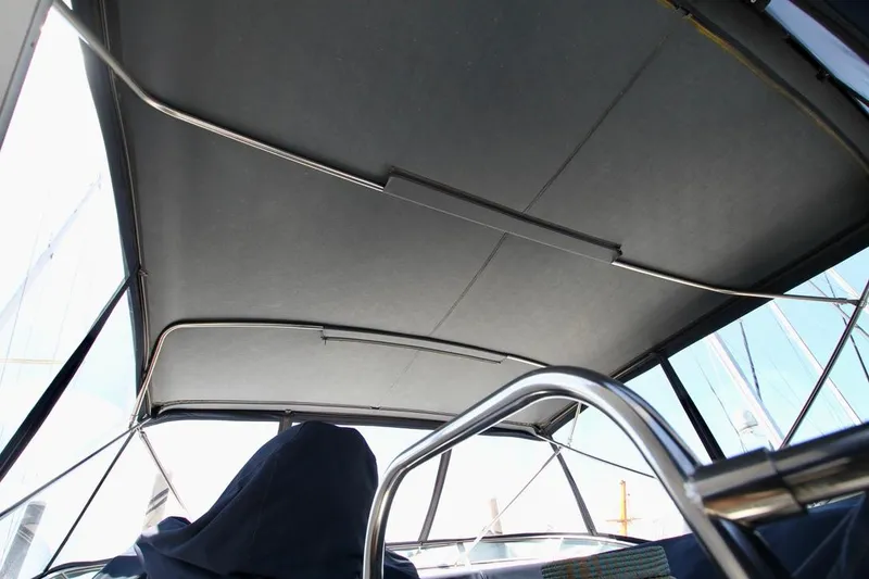 Slide: The Image of Interior view of a 2002 Bayliner 3988 boat canopy and railing. - 25