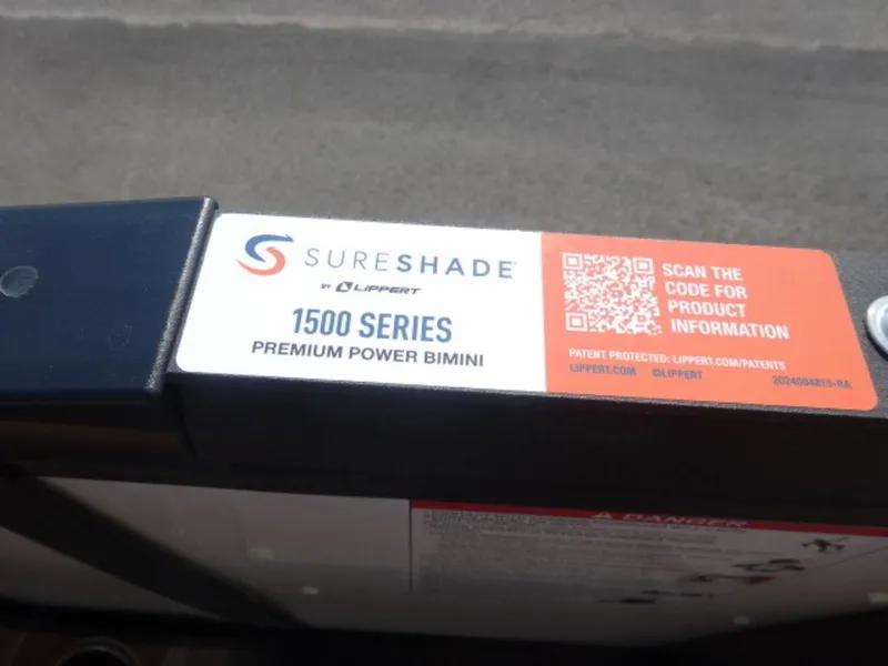 Slide: The Image of SureShade 1500 Series Premium Power Bimini label on Harris Cruiser 250 LUX 2025. - 12