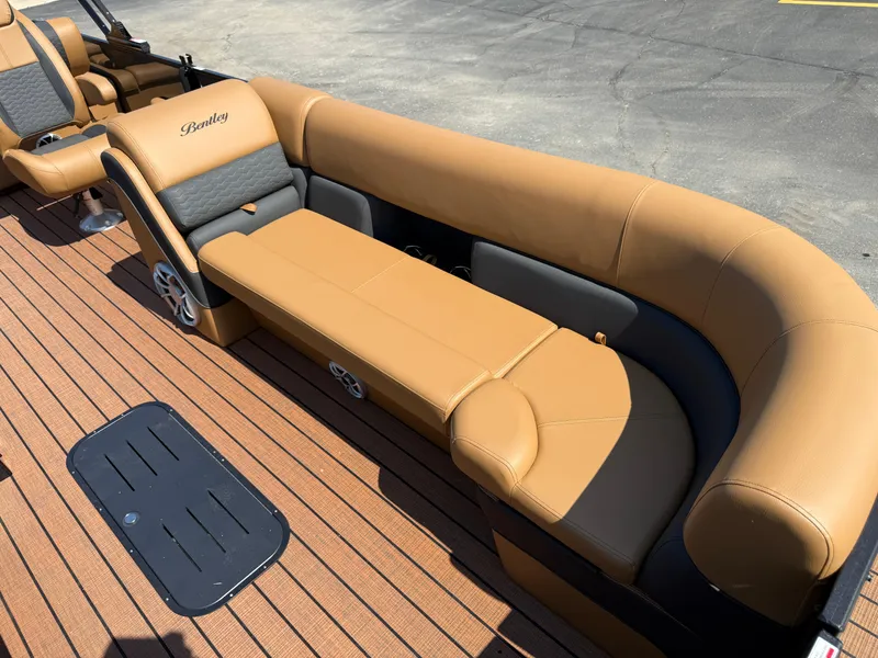 Slide: The Image of Luxurious seating on 2026 Bentley Pontoons Elite 253 QSB with tan and gray upholstery. - 11